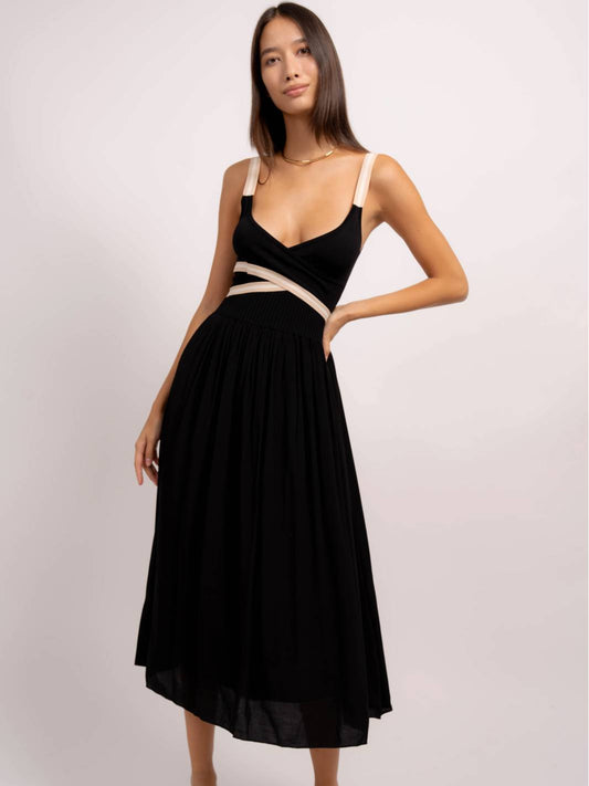 Central Park West. Black pleated dress with contrast straps and sash. Women's spring dress. Mackinac Island clothing store