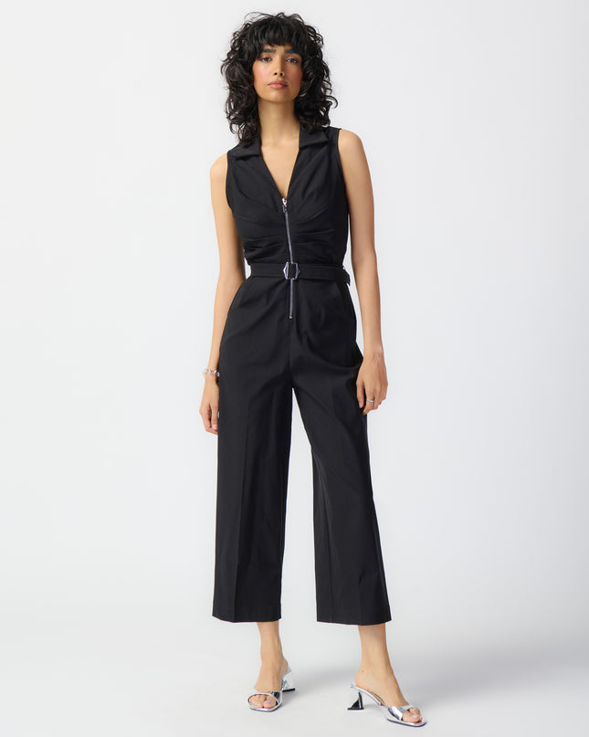 Joseph Ribkoff, sleeveless millennium jumpsuit. Designed with sleek creased culotte pants and features a finely tailored shirt collar and pleated V-neck bodice 