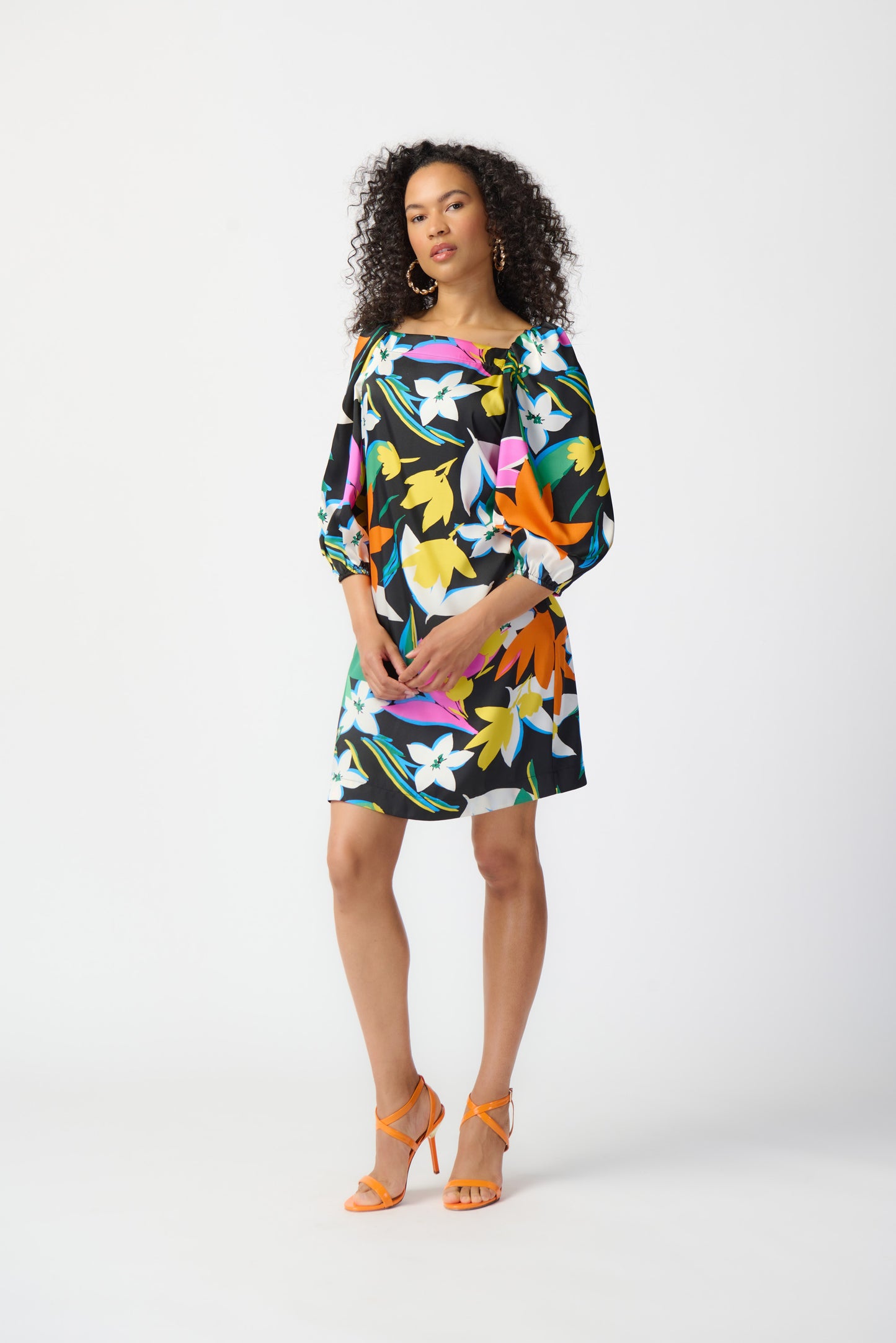 Joseph Ribkoff long-sleeved satin dress, colorful floral print. Square neckline, puff sleeves. Women's spring dress. Spring collection. Women's boutique. Mackinac Island