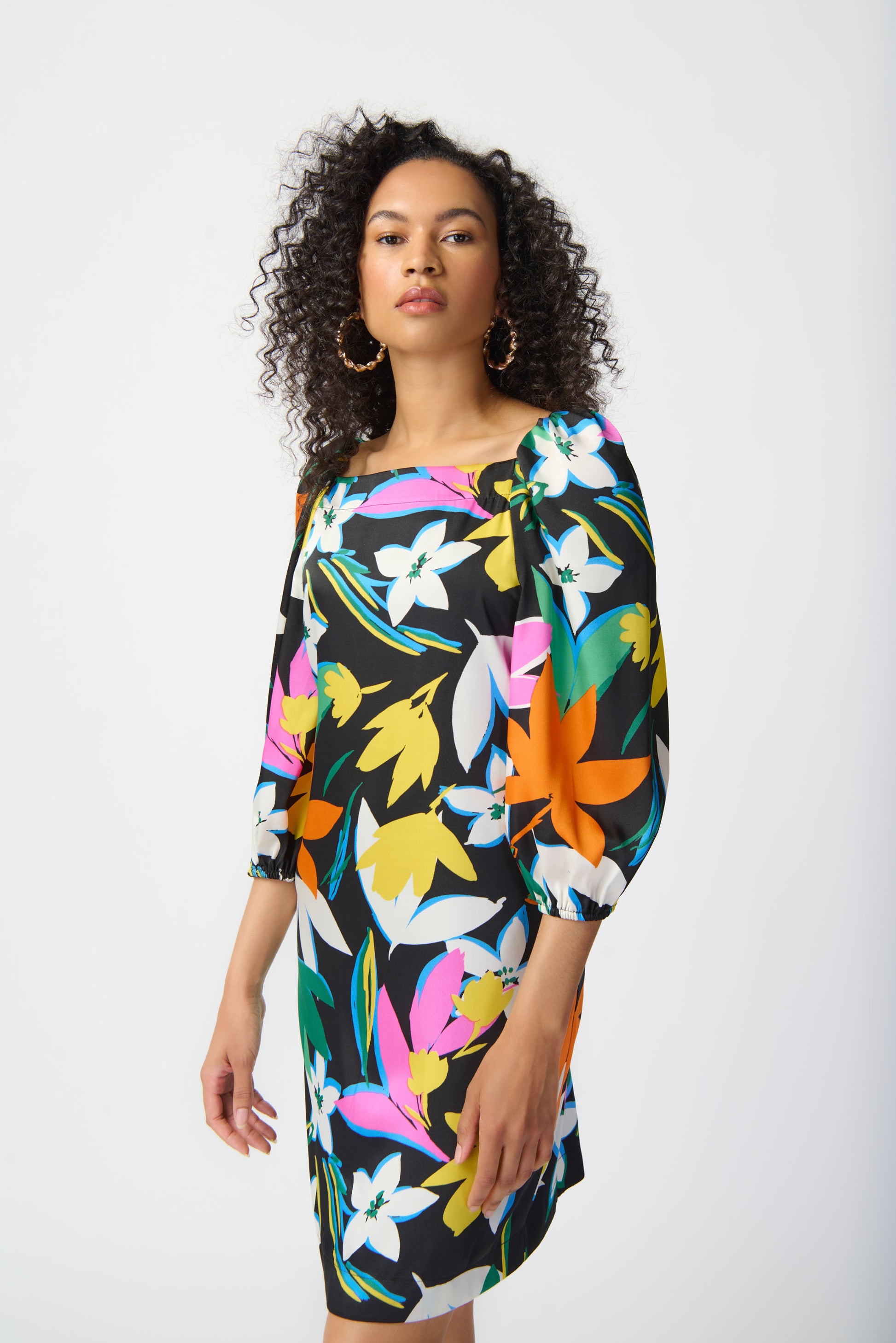 Joseph Ribkoff long-sleeved satin dress, colorful floral print. Square neckline, puff sleeves. Women's spring dress. Spring collection. Women's boutique. Mackinac Island