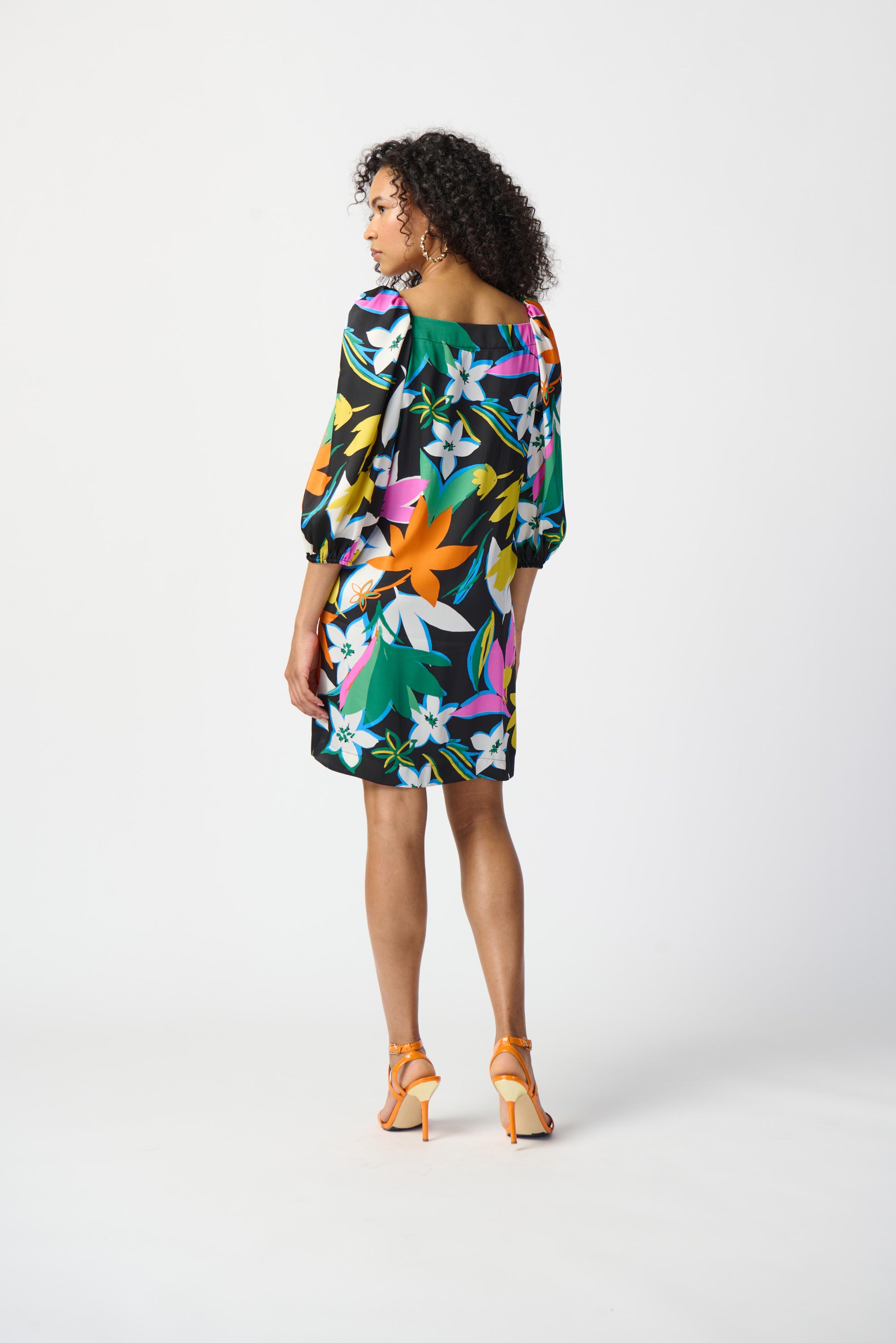 Joseph Ribkoff long-sleeved satin dress, colorful floral print. Square neckline, puff sleeves. Women's spring dress. Spring collection. Women's boutique. Mackinac Island