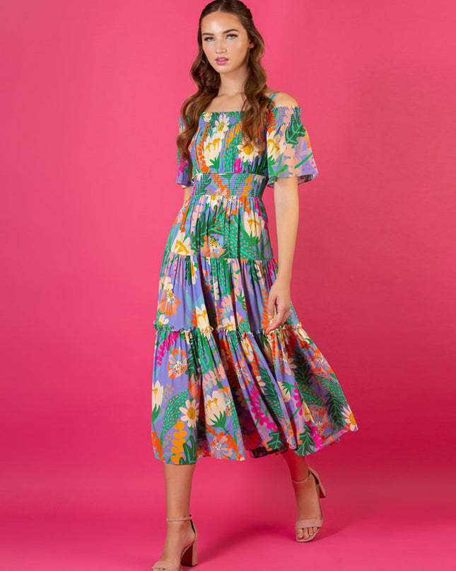 Jessie Liu Collection. 100% Silk. Summer floral print optional cold shoulder tiered dress with smocking details on the shoulder and waist. Summer dress. Available at Rustic Chic Boutique, Mackinac Island Michigan