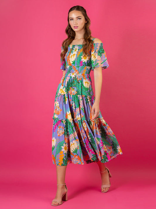 Jessie Liu Collection. 100% Silk. Summer floral print optional cold shoulder tiered dress with smocking details on the shoulder and waist. Summer dress. Available at Rustic Chic Boutique, Mackinac Island Michigan