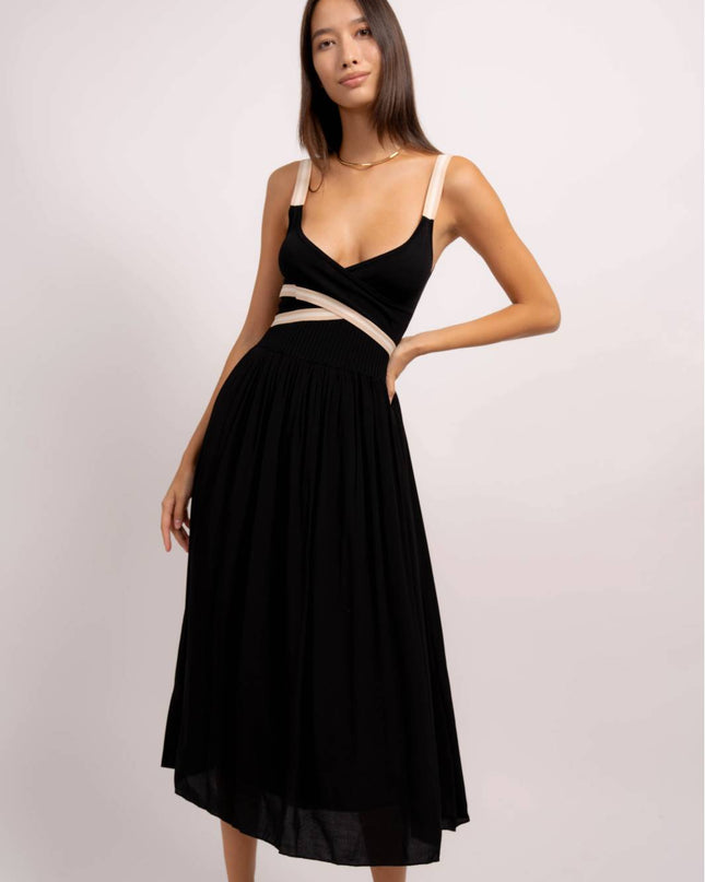 Central Park West. Black pleated dress with contrast straps and sash. Women's spring dress. Mackinac Island clothing store
