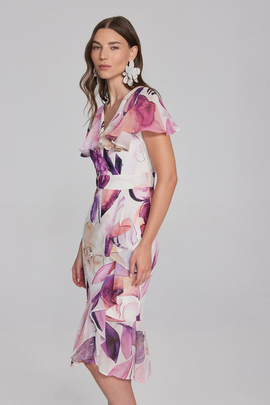 Enchant in this floral scuba crepe trumpet dress. Chiffon poncho sleeves, ruffles add whimsy and feminine grace. Wrap neckline, back zipper for flattering fit. Mackinac Island clothing store