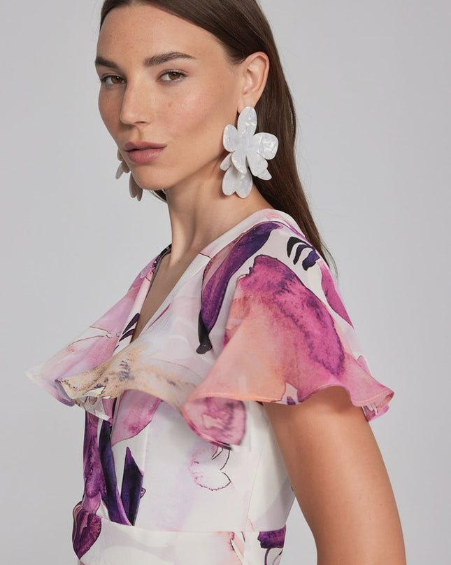 Enchant in this floral scuba crepe trumpet dress. Chiffon poncho sleeves, ruffles add whimsy and feminine grace. Wrap neckline, back zipper for flattering fit. Mackinac Island clothing store