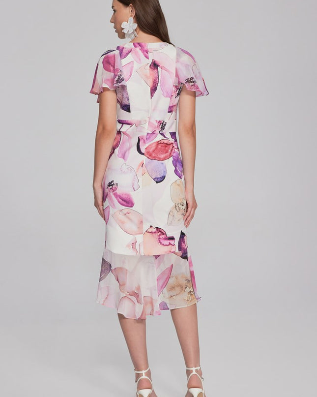Enchant in this floral scuba crepe trumpet dress. Chiffon poncho sleeves, ruffles add whimsy and feminine grace. Wrap neckline, back zipper for flattering fit. Mackinac Island clothing store