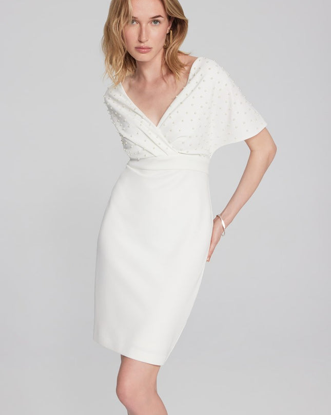 Joseph Ribkoff scuba crepe gown: trumpet skirt, ruffle, slit; wrap neckline, V-shaped back exude sophistication. Ideal for special occasions.